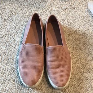Pink slip on sneakers